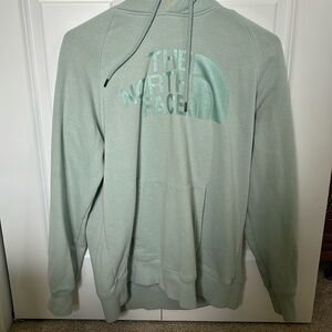 women’s north face teal sweatshirt in size M!